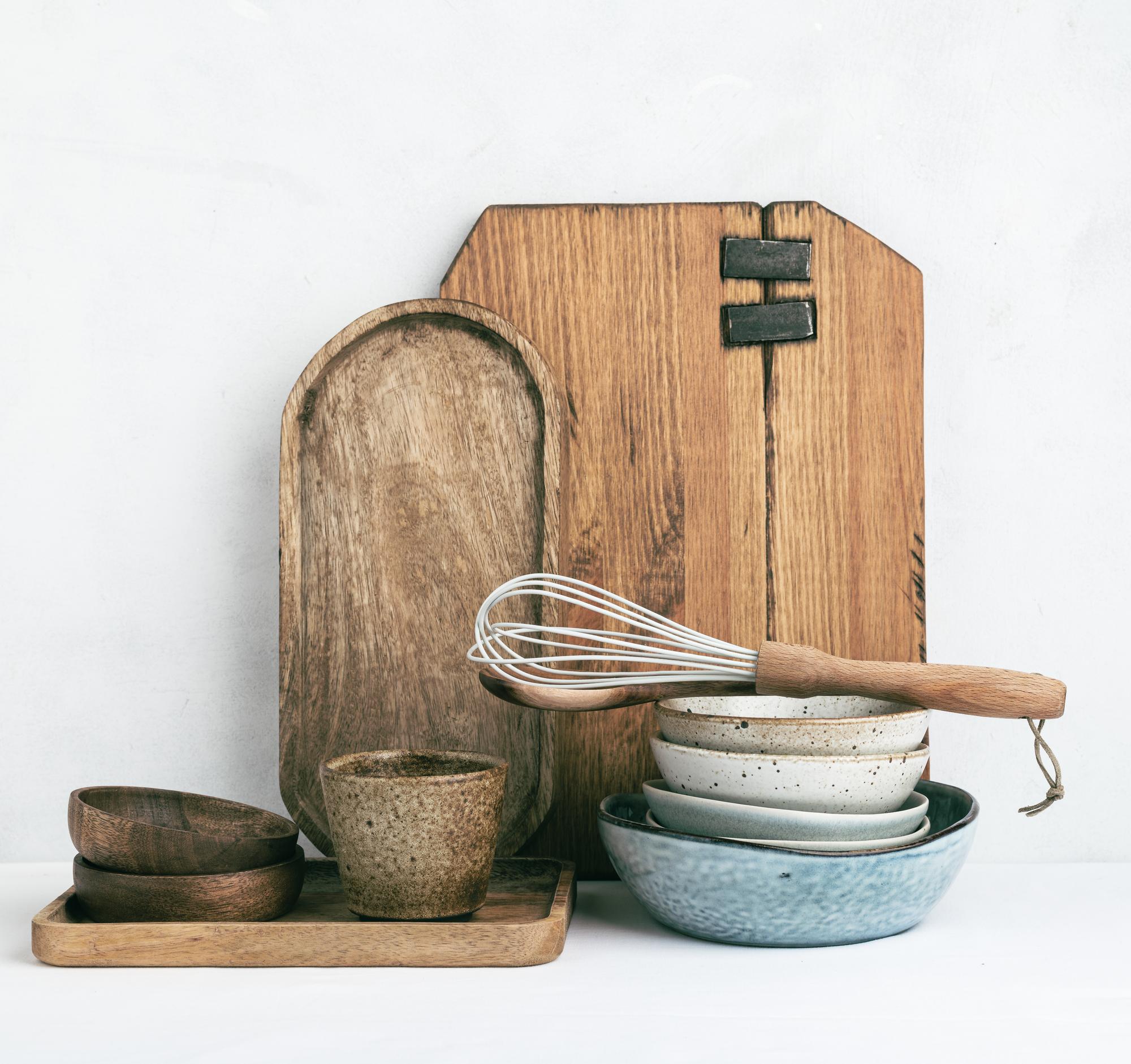 Interior of a small culinary studio with wooden table and tools